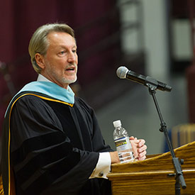 professor speaking at graduation